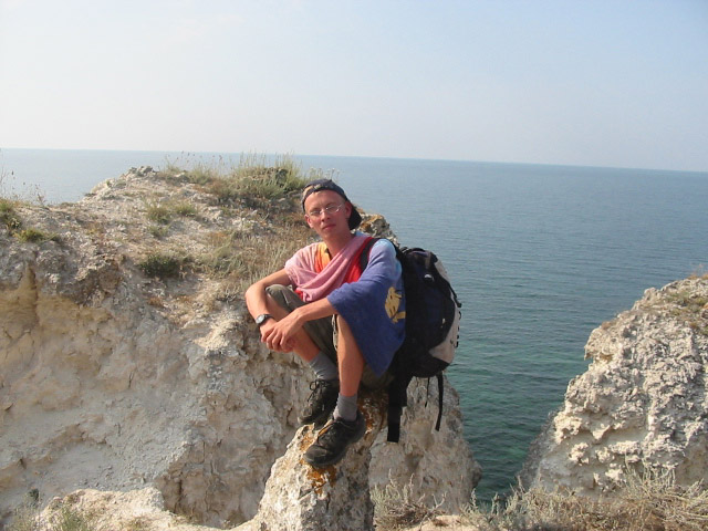 Я сижу на скалушке